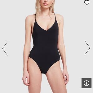 ANEMOS NEW NO TAG
Solid Plunging-Neck Open-Back One-Piece